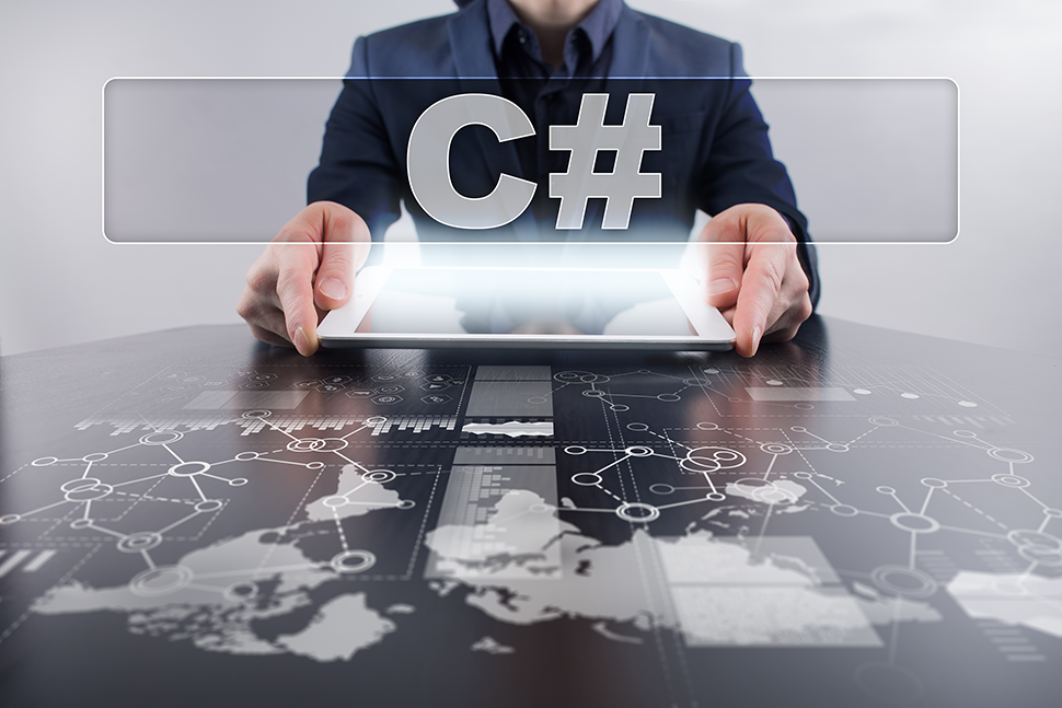 Man holding tablet visualizing C#